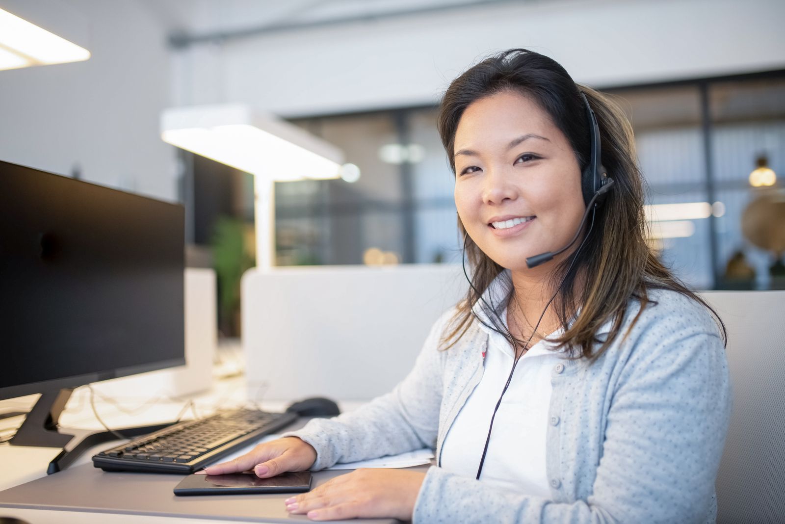 A member desk agent taking a call